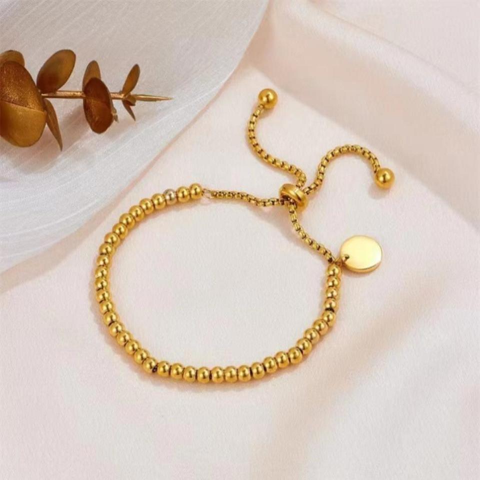 ° ° Pulsera ajustable dorada ° °